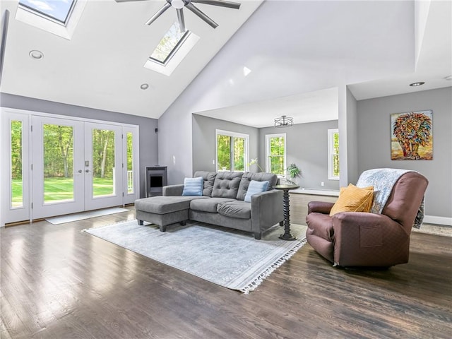 511 Central Pike, Scituate, RI 02857 - living room with a skylight, high vaulted ceiling, ceiling fan, wood finished floors, and baseboards