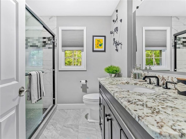 511 Central Pike, Scituate, RI 02857 - bathroom featuring marble finish flooring, plenty of natural light, vanity, and a shower stall