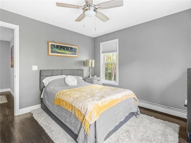 511 Central Pike, Scituate, RI 02857 - bedroom with a baseboard radiator, baseboards, wood finished floors, and ceiling fan