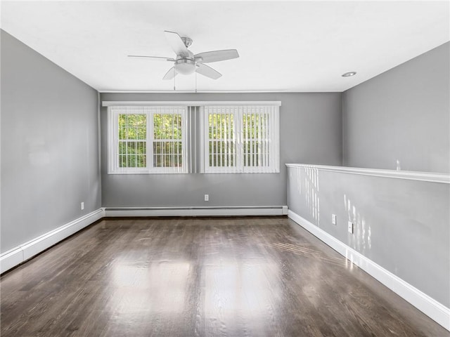 511 Central Pike, Scituate, RI 02857 - empty room featuring ceiling fan, a baseboard radiator, wood finished floors, and baseboards