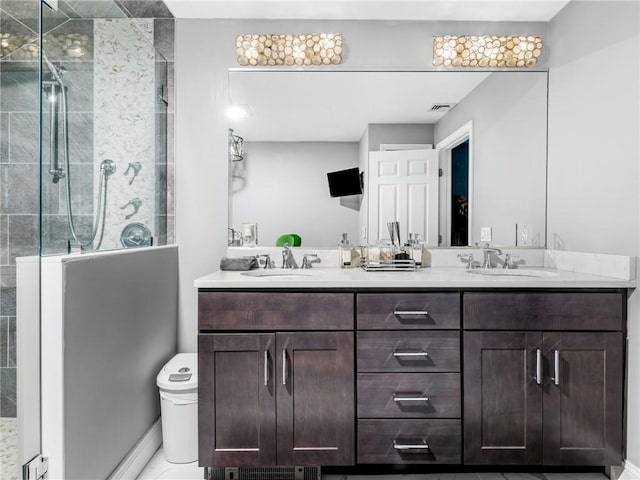 511 Central Pike, Scituate, RI 02857 - bathroom with double vanity, tiled shower, toilet, and baseboards