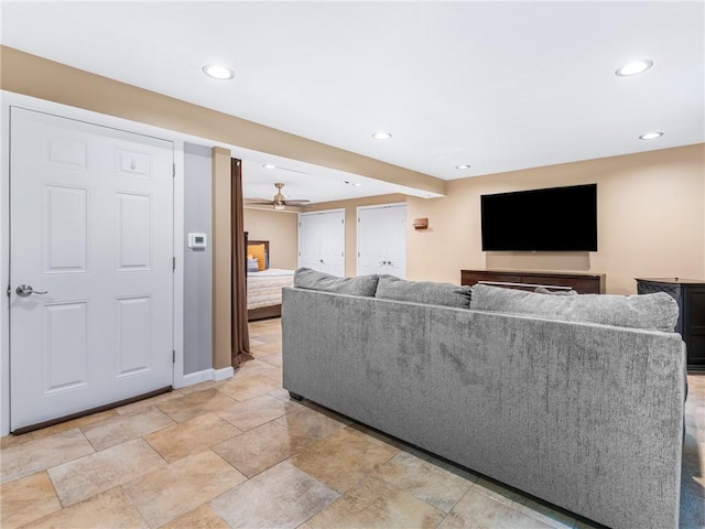 511 Central Pike, Scituate, RI 02857 - living area with a ceiling fan, recessed lighting, baseboards, and light stone finish flooring