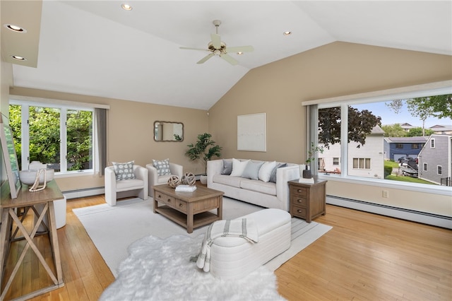 45 Landon Rd, Warwick, RI 02888 - living room with a baseboard radiator, vaulted ceiling, ceiling fan, light wood-style floors, and recessed lighting