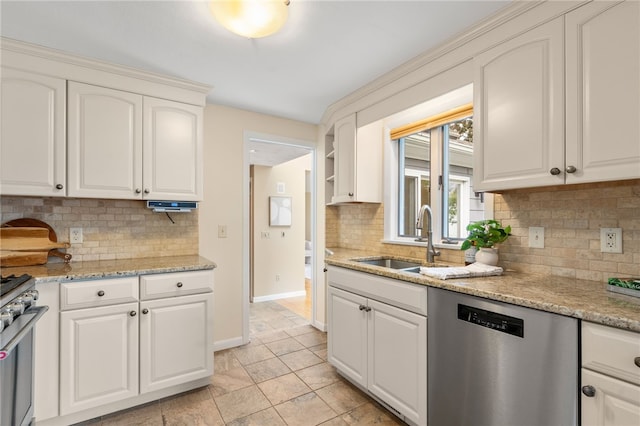 45 Landon Rd, Warwick, RI 02888 - kitchen with appliances with stainless steel finishes, backsplash, a sink, and baseboards