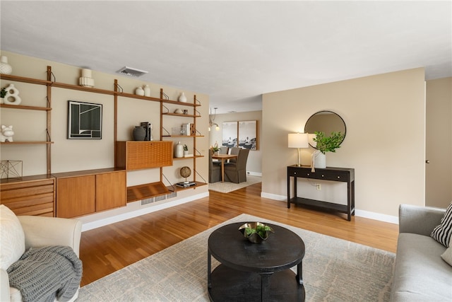 45 Landon Rd, Warwick, RI 02888 - living area featuring wood finished floors and baseboards