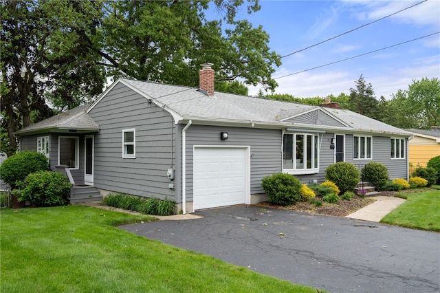 45 Landon Rd, Warwick, RI 02888 - ranch-style house with a chimney, a garage, a front lawn, driveway, and roof with shingles