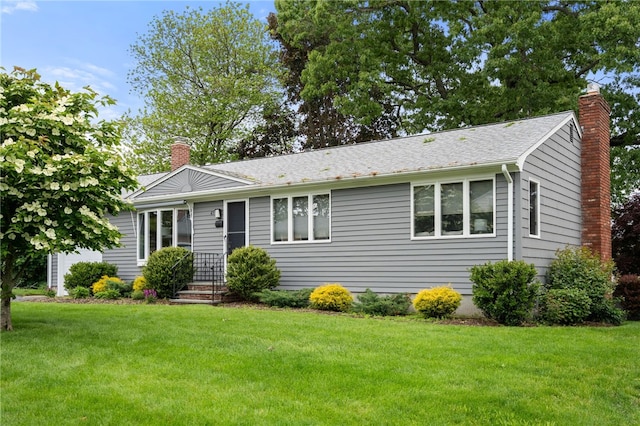 45 Landon Rd, Warwick, RI 02888 - single story home featuring a chimney and a front yard