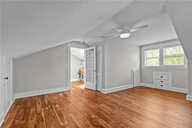 4 Red Cross Ave Unit 4, Newport, RI 02840 - bonus room featuring vaulted ceiling, wood finished floors, ceiling fan, baseboards, and french doors