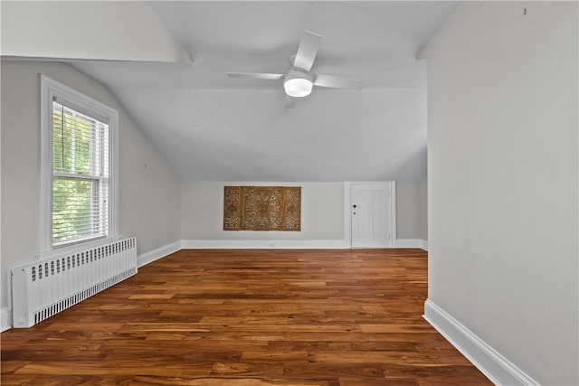 4 Red Cross Ave Unit 4, Newport, RI 02840 - additional living space with radiator, wood finished floors, lofted ceiling, baseboards, and ceiling fan
