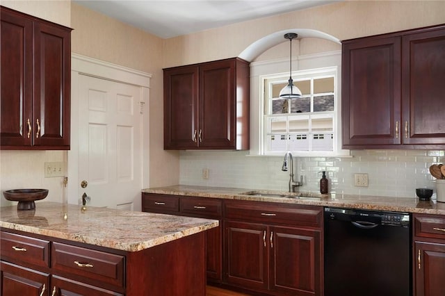 47 Lyndhurst Ave, Providence, RI 02908 - kitchen with black dishwasher, a sink, hanging light fixtures, and tasteful backsplash