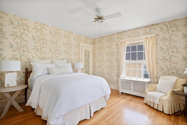 47 Lyndhurst Ave, Providence, RI 02908 - bedroom with wood finished floors, radiator, a ceiling fan, and baseboards
