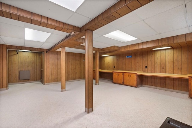 47 Lyndhurst Ave, Providence, RI 02908 - finished basement with a paneled ceiling, wood walls, and carpet