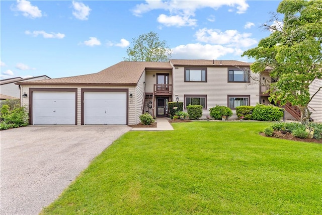 30 Sweet Meadow Ct Unit 15, Narragansett, RI 02882 - view of front of property featuring a garage, asphalt driveway, a front lawn, and a balcony