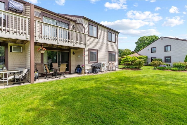 30 Sweet Meadow Ct Unit 15, Narragansett, RI 02882 - rear view of house with a patio area, a lawn, and a deck