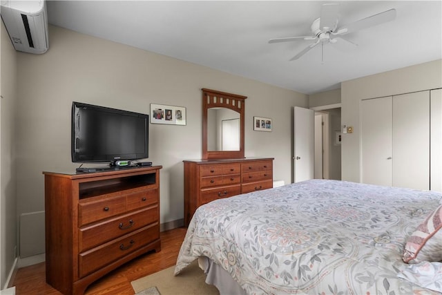 30 Sweet Meadow Ct Unit 15, Narragansett, RI 02882 - bedroom featuring wood finished floors, a closet, baseboards, and ceiling fan