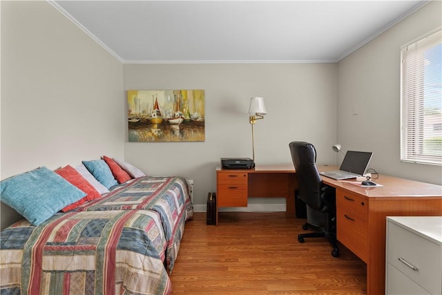 30 Sweet Meadow Ct Unit 15, Narragansett, RI 02882 - bedroom with light wood finished floors, crown molding, a desk, and baseboards