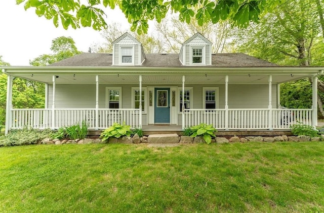 235 Spring St, Hopkinton, RI 02832 - farmhouse-style home featuring covered porch and a front yard