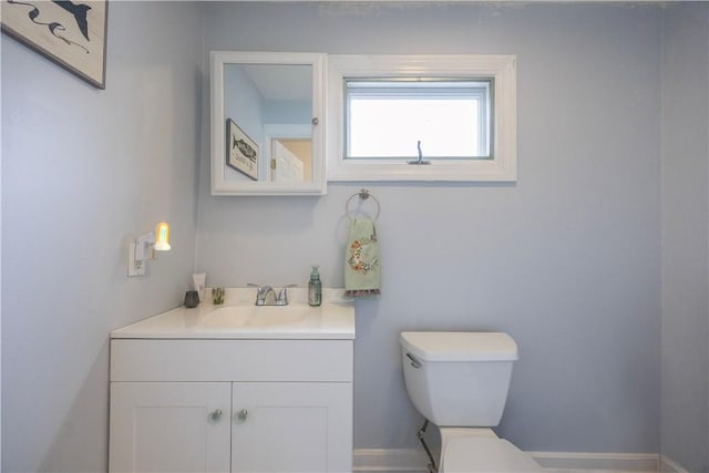 16 Malvern Ave, Cranston, RI 02905 - half bathroom with toilet, vanity, and baseboards