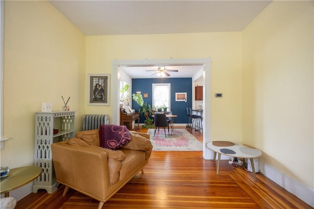 16 Malvern Ave, Cranston, RI 02905 - living room with radiator heating unit, wood finished floors, and ceiling fan