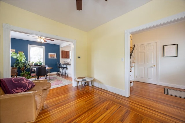 16 Malvern Ave, Cranston, RI 02905 - living room featuring a ceiling fan, light wood finished floors, and baseboards
