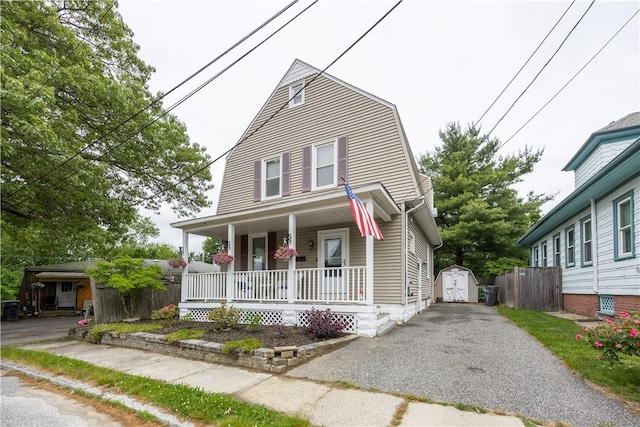 16 Malvern Ave, Cranston, RI 02905 - dutch colonial with a porch, a gambrel roof, and driveway