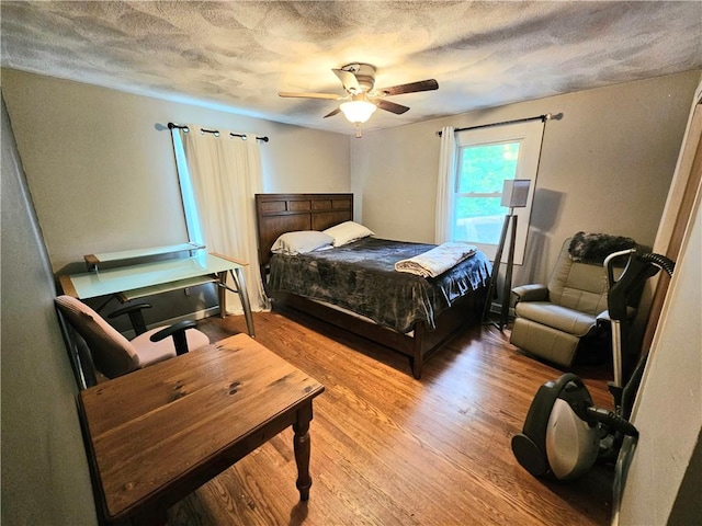 5 Martin St, Coventry, RI 02816 - bedroom featuring light wood-type flooring, a textured ceiling, and ceiling fan
