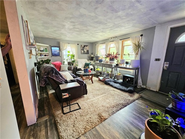 5 Martin St, Coventry, RI 02816 - living area featuring wood finished floors and a textured ceiling