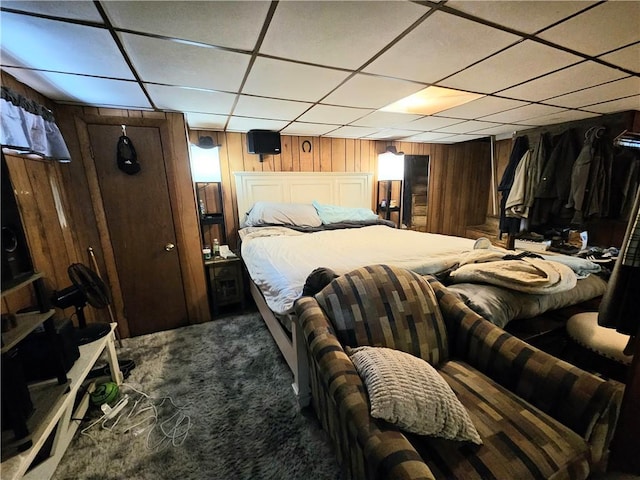 5 Martin St, Coventry, RI 02816 - carpeted bedroom with wooden walls and a drop ceiling