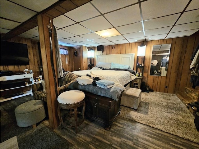 5 Martin St, Coventry, RI 02816 - bedroom featuring wood walls, wood finished floors, and a drop ceiling