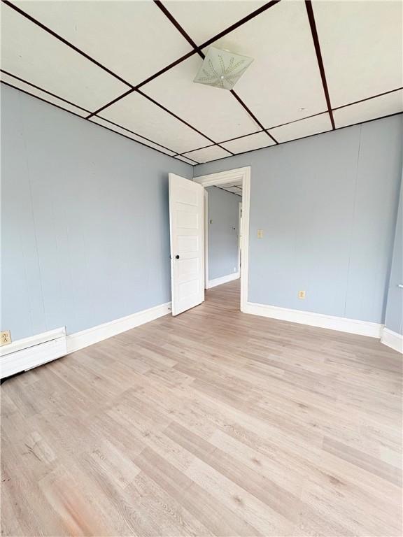 74 Pontiac St, Warwick, RI 02886 - unfurnished room featuring light wood finished floors and baseboards