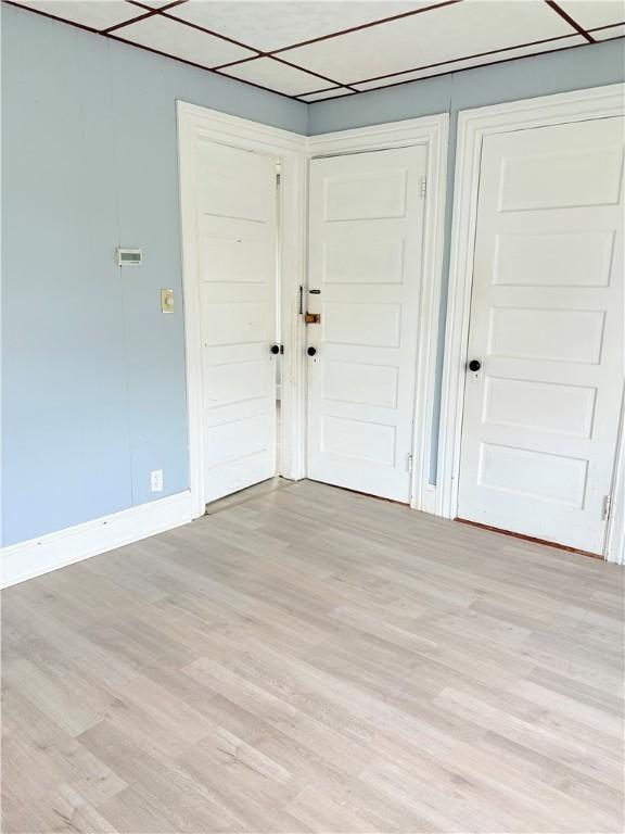 74 Pontiac St, Warwick, RI 02886 - entrance foyer featuring light wood finished floors and baseboards