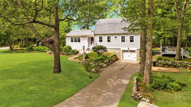 24 Stenton Ave, Westerly, RI 02891 - dutch colonial featuring driveway, a garage, a front yard, and a shingled roof