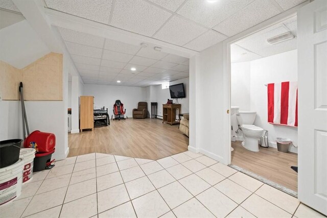 320 Beverage Hill Ave, Pawtucket, RI 02861 - finished basement featuring wood finished floors, a paneled ceiling, recessed lighting, and baseboards