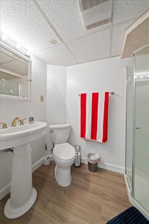 320 Beverage Hill Ave, Pawtucket, RI 02861 - full bathroom with a shower stall, toilet, wood finished floors, and baseboards