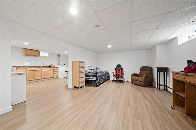 320 Beverage Hill Ave, Pawtucket, RI 02861 - living area featuring light wood-style floors, a drop ceiling, recessed lighting, washer / clothes dryer, and baseboards