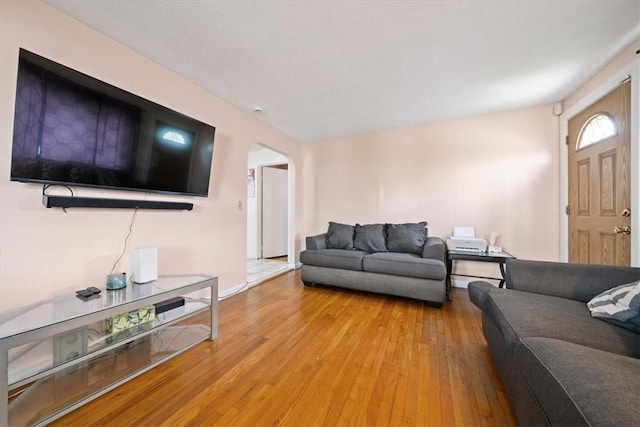 320 Beverage Hill Ave, Pawtucket, RI 02861 - living room featuring arched walkways and hardwood / wood-style floors