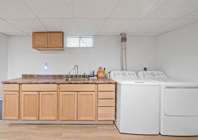 320 Beverage Hill Ave, Pawtucket, RI 02861 - laundry area featuring cabinet space, washer and clothes dryer, and light wood-type flooring