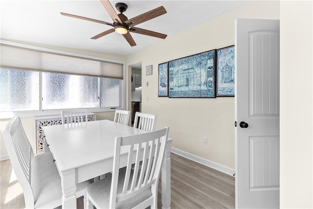 30 Brown St Unit 2, Narragansett, RI 02882 - dining room with ceiling fan, light wood-style flooring, and baseboards