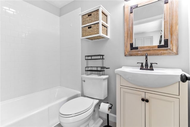 30 Brown St Unit 2, Narragansett, RI 02882 - bathroom featuring toilet, vanity, baseboards, and washtub / shower combination