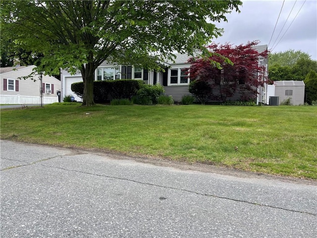 11 Laurelhurst Rd, Cranston, RI 02920 - view of property hidden behind natural elements with cooling unit and a front yard