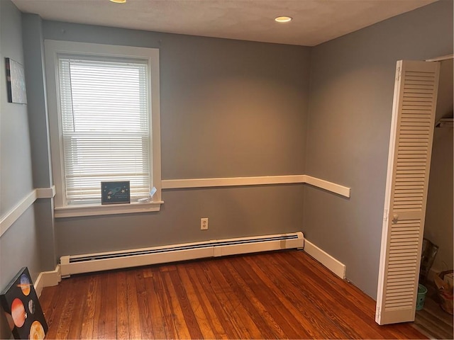 1097 Pontiac Ave, Cranston, RI 02910 - spare room with a baseboard heating unit, wood finished floors, recessed lighting, and baseboards