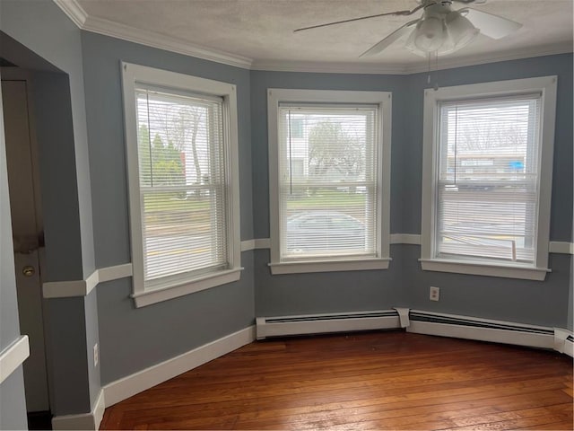 1097 Pontiac Ave, Cranston, RI 02910 - spare room with plenty of natural light, a baseboard radiator, ceiling fan, wood-type flooring, and ornamental molding
