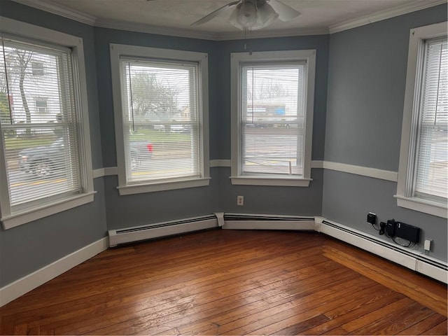 1097 Pontiac Ave, Cranston, RI 02910 - unfurnished room featuring ceiling fan, ornamental molding, and dark wood-style flooring