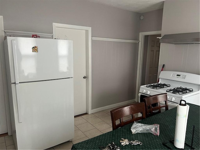 1097 Pontiac Ave, Cranston, RI 02910 - kitchen featuring white appliances, light tile patterned flooring, and wall chimney range hood