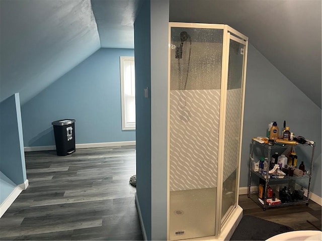 1097 Pontiac Ave, Cranston, RI 02910 - full bathroom with vaulted ceiling, wood finished floors, a stall shower, and baseboards