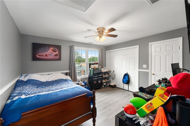 62 Andrews Ave, West Warwick, RI 02893 - bedroom featuring a closet, wood finished floors, a ceiling fan, and attic access