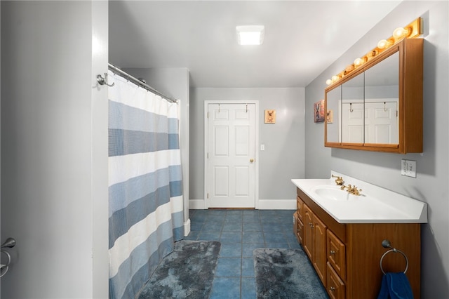 62 Andrews Ave, West Warwick, RI 02893 - full bathroom with vanity, tile patterned floors, baseboards, and a shower with shower curtain