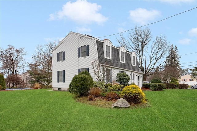 6 Lake Dr, North Providence, RI 02904 - view of property exterior with a lawn, a gambrel roof, and a shingled roof