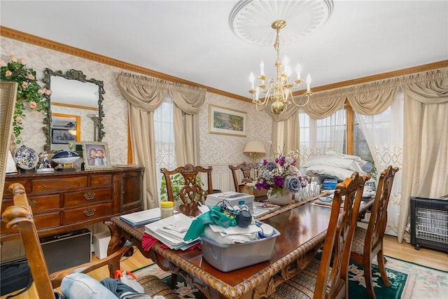 6 Lake Dr, North Providence, RI 02904 - dining area featuring wallpapered walls, a chandelier, wood finished floors, and crown molding