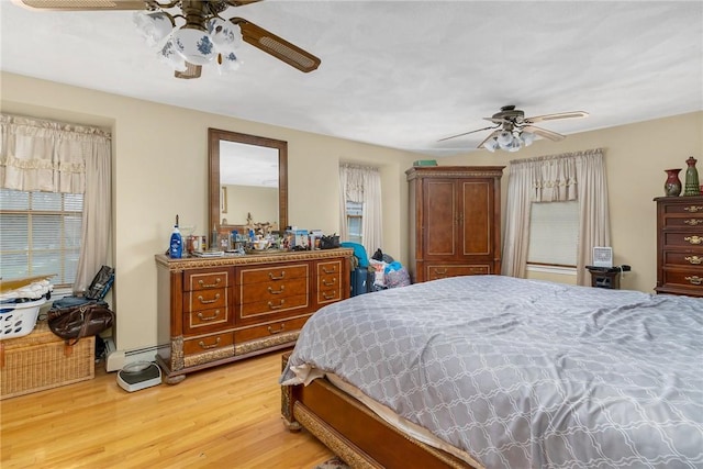 6 Lake Dr, North Providence, RI 02904 - bedroom with light wood-style floors and ceiling fan